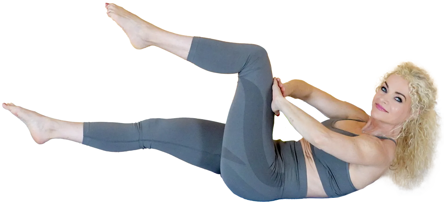 Aniko doing a Pilates criss-cross exercise